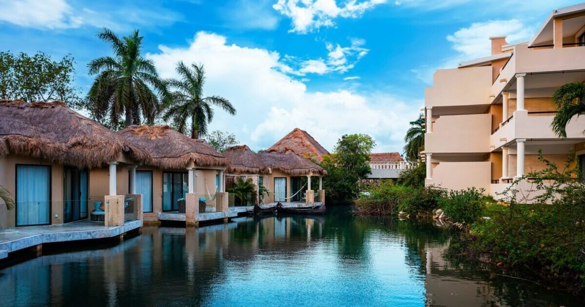 Beautiful,Tropical,Bungalows,Along,A,River,Inside,Of,A,Luxury