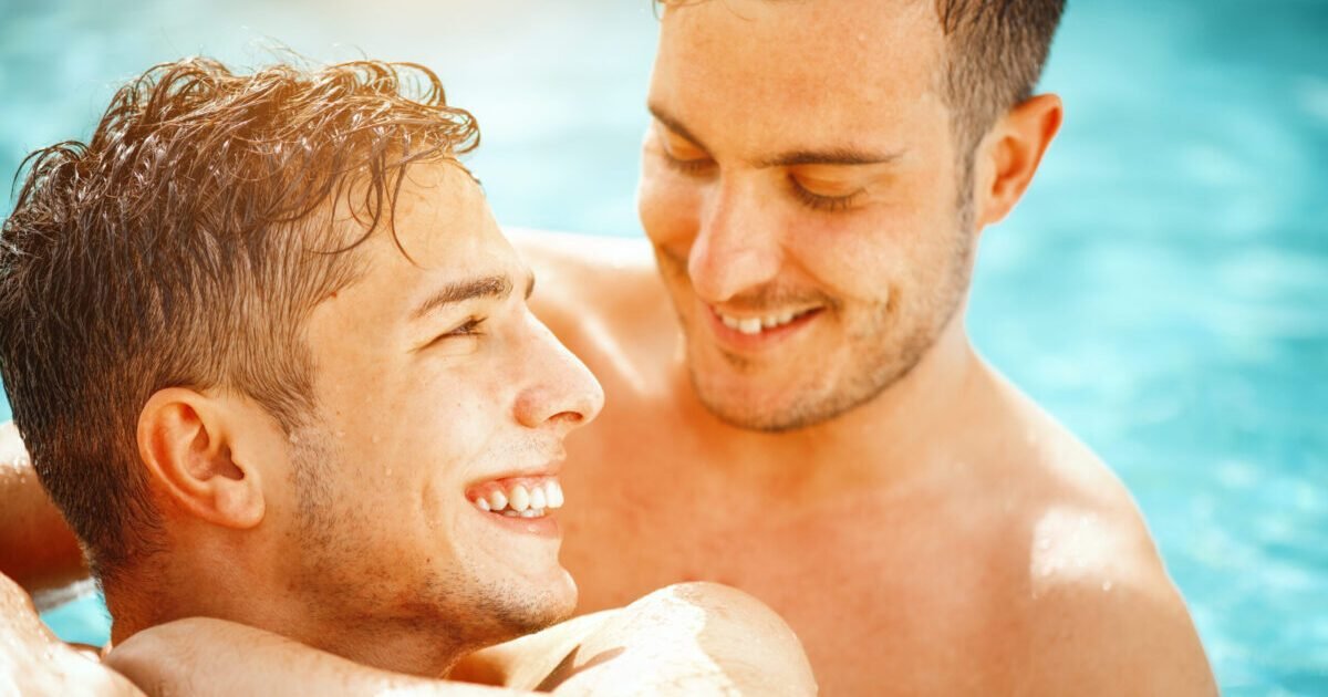 Gay,Couple,Relaxing,In,Swimming,Pool.,Lgbt.,Two,Young,Men Gay,Couple,Relaxing,In,Swimming,Pool.,Lgbt.,Two,Young,Men