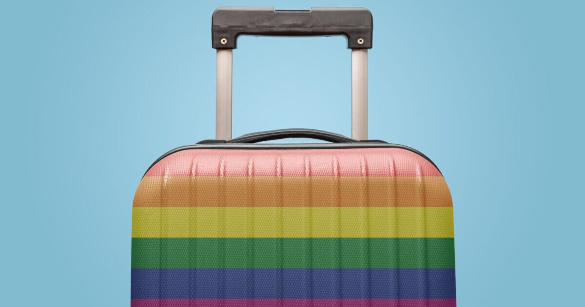 Suitcase,With,Rainbow,Gay,Flag,Design,Travel,Concept. Suitcase,With,Rainbow,Gay,Flag,Design,Travel,Concept.